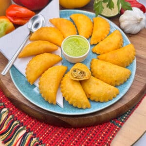 Mini empanadas filled with shredded chicken