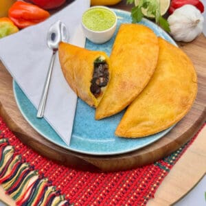 Classic vegan corn empanadas filled with black bean and vegetables