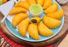 Mini vegan empanadas fille with black bean and vegetables