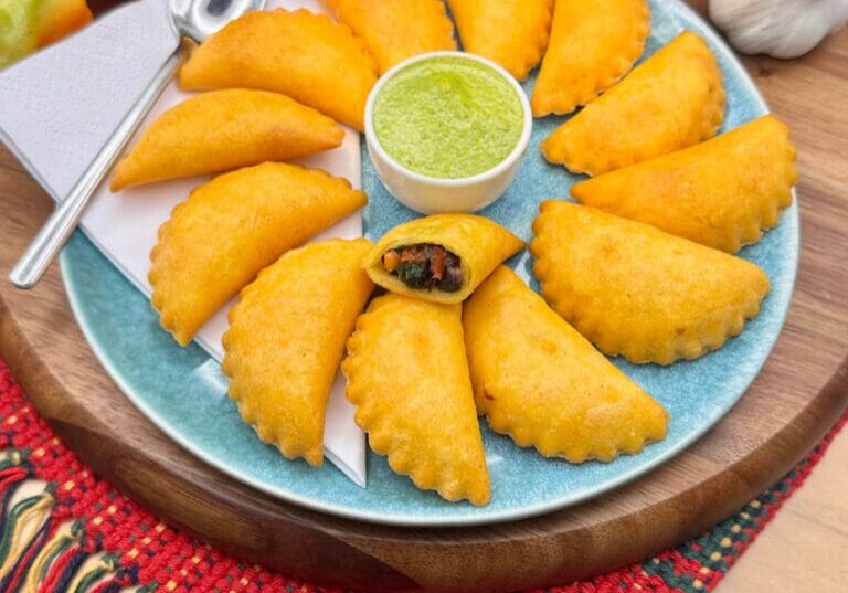 Mini vegan empanadas fille with black bean and vegetables