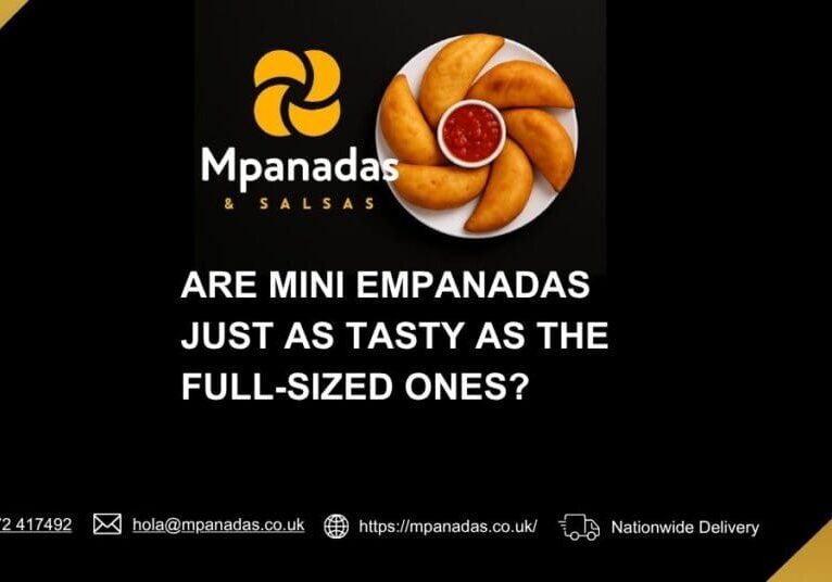 Mini empanadas arranged in a circular pattern with dipping sauce in the center.